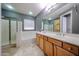 Bathroom featuring double sinks, a bathtub, shower, and recessed lighting at 16528 W Lariat Ln, Surprise, AZ 85387