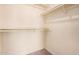 Walk-in closet offering ample storage space with shelving and carpet at 17830 N 45Th Ave, Glendale, AZ 85308