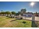 A community pool featuring a fenced area and well-maintained landscaping at 17830 N 45Th Ave, Glendale, AZ 85308