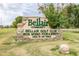 Welcoming community sign for Bellair, featuring beautiful stone accents and mature landscaping at 17830 N 45Th Ave, Glendale, AZ 85308