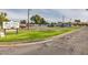 Wide shot of the Iron Works parking lot on a sunny day at 17830 N 45Th Ave, Glendale, AZ 85308