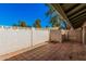 Private patio with tiled flooring and white block wall at 17830 N 45Th Ave, Glendale, AZ 85308