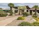 An inviting restaurant exterior with lush landscaping, ample parking, and inviting outdoor seating at 17830 N 45Th Ave, Glendale, AZ 85308