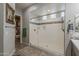 Beautiful bathroom with walk-in shower featuring glass doors, tile accents, and modern fixtures at 18066 N Stonegate Rd, Maricopa, AZ 85138