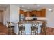Well-equipped kitchen with ample counter space, stainless steel appliances, and a functional layout at 18137 W Deer Creek Rd, Goodyear, AZ 85338
