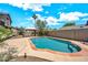 Backyard view of a refreshing pool with a gazebo and a palm tree at 1903 E Jasper Dr, Chandler, AZ 85225