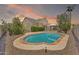 A backyard featuring a private pool, patio, and gazebo, perfect for outdoor entertaining and relaxation at 1903 E Jasper Dr, Chandler, AZ 85225