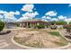 View of the back of the home with a large backyard and pool at 20826 S Hadrian Way, Queen Creek, AZ 85142