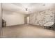 Large bedroom with ceiling fan, neutral carpet, and bright accent wall at 20826 S Hadrian Way, Queen Creek, AZ 85142