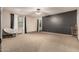 Spacious bedroom with neutral carpet and large windows that let in lots of natural light at 20826 S Hadrian Way, Queen Creek, AZ 85142