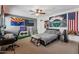 Sports themed bedroom featuring flags, pennants and a cool color scheme at 20826 S Hadrian Way, Queen Creek, AZ 85142