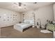 Inviting bedroom with stylish accents, including modern decor and a comfortable bed at 20826 S Hadrian Way, Queen Creek, AZ 85142
