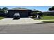 Well-maintained home featuring a spacious driveway and two-car garage, great curb appeal at 20826 S Hadrian Way, Queen Creek, AZ 85142