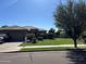 Charming single-story home with well-manicured lawn and mature tree in a desirable neighborhood at 20826 S Hadrian Way, Queen Creek, AZ 85142