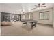 Large recreation room featuring a pool table, bean bag chair and bar seating at 20826 S Hadrian Way, Queen Creek, AZ 85142