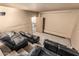 Home theater with multi-level seating, theater decor and ambient lighting at 20826 S Hadrian Way, Queen Creek, AZ 85142