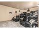 Comfortable home theater with reclining leather seating and movie decor at 20826 S Hadrian Way, Queen Creek, AZ 85142