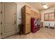 Laundry room with cabinets, countertop space, and modern washer/dryer units at 20826 S Hadrian Way, Queen Creek, AZ 85142