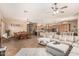 Open living space featuring a dining area, kitchen, and comfortable seating at 20826 S Hadrian Way, Queen Creek, AZ 85142
