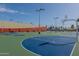 Outdoor basketball court with multiple hoops and ample lighting at 2214 N 7Th Ave, Phoenix, AZ 85007
