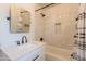Modern bathroom features marble tile, bronze fixtures, and elegant vanity at 2214 N 7Th Ave, Phoenix, AZ 85007