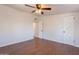 Bedroom features wood-look tile floors, ceiling fan and standard closet at 2214 N 7Th Ave, Phoenix, AZ 85007