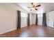 Bedroom featuring wood-look tile floors, and great natural light through two large windows at 2214 N 7Th Ave, Phoenix, AZ 85007