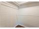 Walk-in closet featuring brick walls and storage racks at 2214 N 7Th Ave, Phoenix, AZ 85007