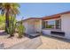 Charming home featuring desert landscaping, a palm tree, and a textured walkway to the front door at 2214 N 7Th Ave, Phoenix, AZ 85007