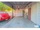 Attached garage with ample storage and parking, complemented by an adjacent utility door at 2214 N 7Th Ave, Phoenix, AZ 85007