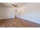 Large, open living space with wood-look floors, recessed lighting, and neutral walls for versatile decorating at 2214 N 7Th Ave, Phoenix, AZ 85007