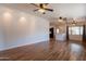 Spacious living room with modern lighting and wood-look floors, providing a warm and inviting atmosphere at 2214 N 7Th Ave, Phoenix, AZ 85007