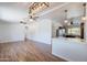 Spacious living room features modern lighting and beautiful wood-look tile flooring at 2214 N 7Th Ave, Phoenix, AZ 85007