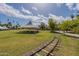 Picturesque park featuring grassy fields, picnic tables under a white tent, and a miniature train track at 2214 N 7Th Ave, Phoenix, AZ 85007