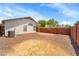 Spacious backyard with gravel, a small patio, and a neutral-colored home exterior, perfect for outdoor enjoyment at 2221 E Union Hills Dr # 148, Phoenix, AZ 85024