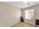 Bedroom with a window, tile flooring and small table at 2221 E Union Hills Dr # 148, Phoenix, AZ 85024