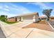 Charming single-story home features a well-maintained front yard and a convenient two-car garage at 2221 E Union Hills Dr # 148, Phoenix, AZ 85024