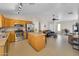 A kitchen with an island, stainless appliances, and an open floor plan to the living area at 2221 E Union Hills Dr # 148, Phoenix, AZ 85024