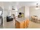 Open floor plan with a kitchen island, stainless appliances, and a great room with lots of space at 2221 E Union Hills Dr # 148, Phoenix, AZ 85024