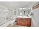 Neat bathroom with a shower, vanity, and well-lit mirror at 2402 E 5Th St # 1520, Tempe, AZ 85288