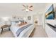 Inviting bedroom featuring a cozy bed, soft carpet, and en suite bathroom at 2402 E 5Th St # 1520, Tempe, AZ 85288