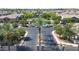 Gated community entrance leading to a refreshing pool and well-maintained landscaping at 2402 E 5Th St # 1520, Tempe, AZ 85288