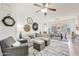 Bright living room with neutral decor, modern accents, and a view into the dining area at 2402 E 5Th St # 1520, Tempe, AZ 85288