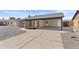 Beautiful curb appeal featuring a low maintenance rock yard and covered parking at 2435 E Harmony Ave, Mesa, AZ 85204