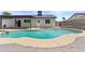 Enjoy the refreshing pool in this backyard oasis, perfect for relaxing and entertaining outdoors at 2435 E Harmony Ave, Mesa, AZ 85204