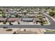 A street view shows a home's exterior and neighborhood, highlighting curb appeal and location at 2435 E Harmony Ave, Mesa, AZ 85204