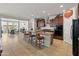 Spacious kitchen with granite countertops, stainless steel appliances, and a large island at 26032 W Quail Ave, Buckeye, AZ 85396