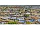 Expansive aerial view of a residential neighborhood with swimming pools and mature trees at 2608 W Columbine Dr, Phoenix, AZ 85029