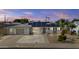 Charming home featuring solar panels, a desert-landscaped front yard, and a freshly painted exterior at 2608 W Columbine Dr, Phoenix, AZ 85029