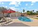 Inviting backyard features a sparkling pool, lounge chairs, and lush landscaping at 2731 N 23Rd Ave, Phoenix, AZ 85009